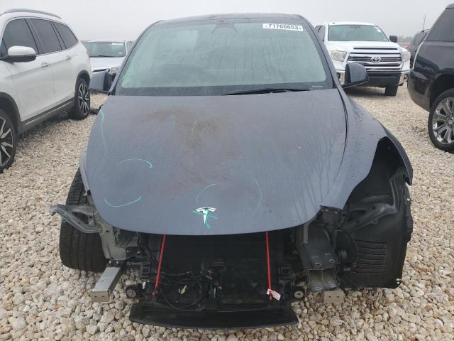 Photo 5 from auction – 2023 TESLA MODEL Y with VIN 7SAYGDEE0PA023929
