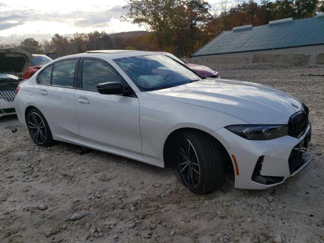 Photo 4 from auction – 2023 BMW 330XI with VIN 3MW89FF08P8D26838