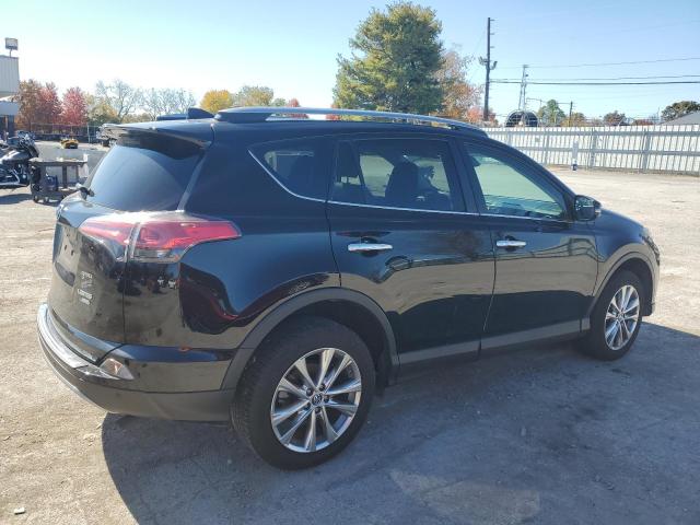 Photo 3 from auction – 2018 TOYOTA RAV4 LIMIT with VIN 2T3DFREV1JW696440