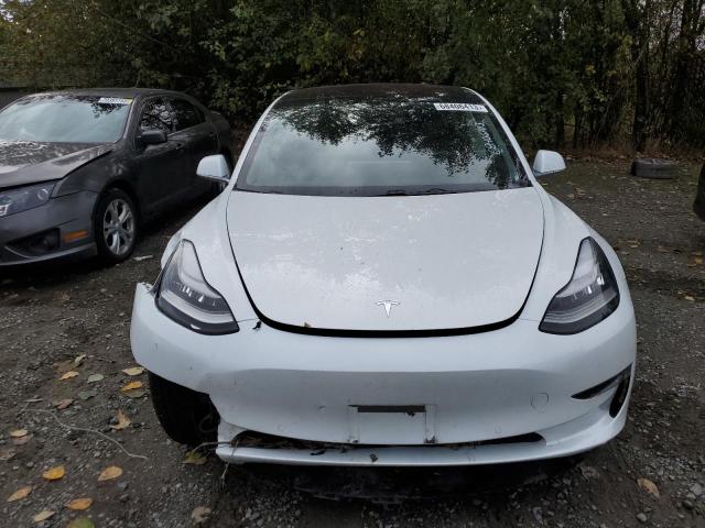 Photo 5 from auction – 2018 TESLA MODEL 3 with VIN 5YJ3E1EAXJF009216