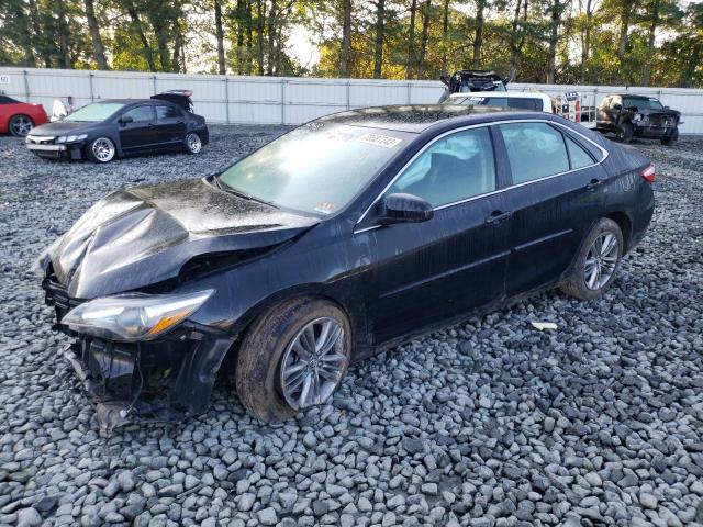 TOYOTA CAMRY LE 2017 with VIN 4T1BF1FK2HU424835 - Photo from auction
