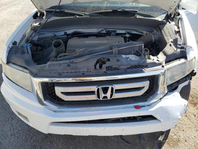 Photo 11 from auction – 2009 HONDA RIDGELINE with VIN 5FPYK16569B108022