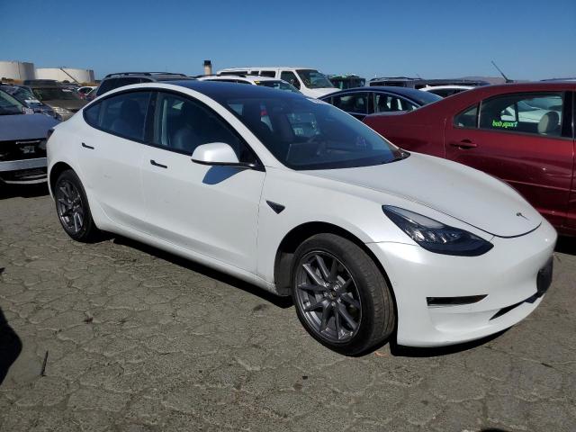 Photo 4 from auction – 2022 TESLA MODEL 3 with VIN 5YJ3E1EB8NF242140