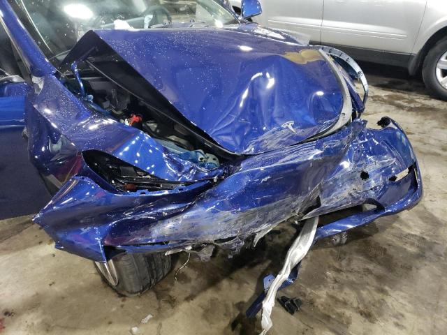 Photo 11 from auction – 2023 TESLA MODEL Y with VIN 7SAYGDEE8PF807228