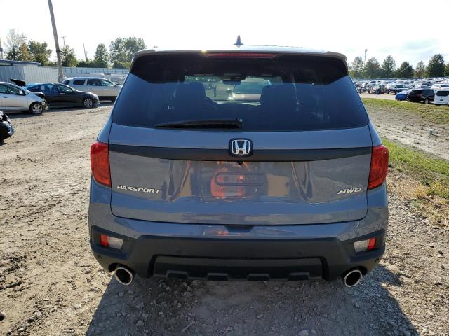 Photo 6 from auction – 2022 HONDA PASSPORT E with VIN 5FNYF8H52NB002289