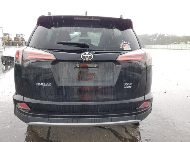 Photo 6 from auction – 2016 TOYOTA RAV4 XLE with VIN 2T3RFREV0GW460263