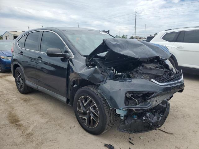 Photo 4 from auction – 2016 HONDA CR-V SE with VIN 5J6RM3H49GL021470