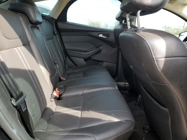 Фото 10 с аукциона – 2014 FORD FOCUS SE с VIN 1FADP3K26EL129708