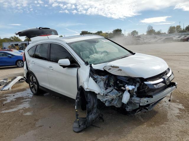 Photo 4 from auction – 2015 HONDA CR-V TOURI with VIN 5J6RM4H94FL063643