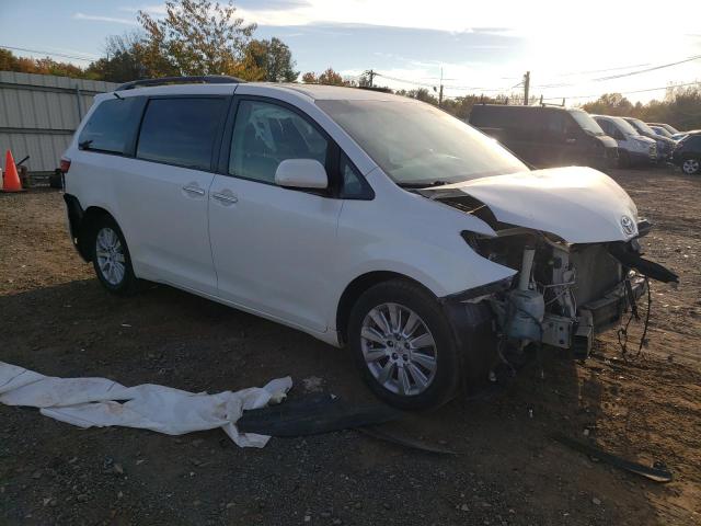 Photo 4 from auction – 2015 TOYOTA SIENNA XLE with VIN 5TDDK3DC7FS112933