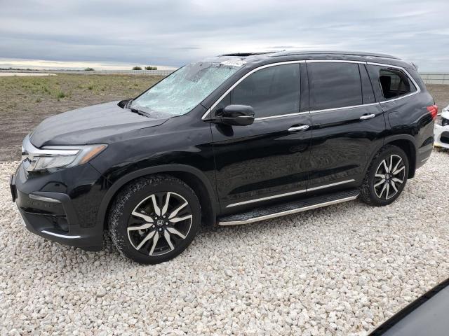 HONDA PILOT TOUR 2021 with VIN 5FNYF5H60MB000093 - Photo from auction
