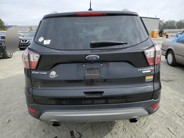 Photo 6 from auction – 2017 FORD ESCAPE TIT with VIN 1FMCU0J93HUF02676