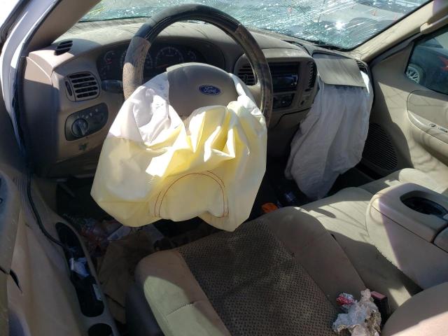 Photo 8 from auction – 2003 FORD F150 with VIN 1FTRX18L63NB82883