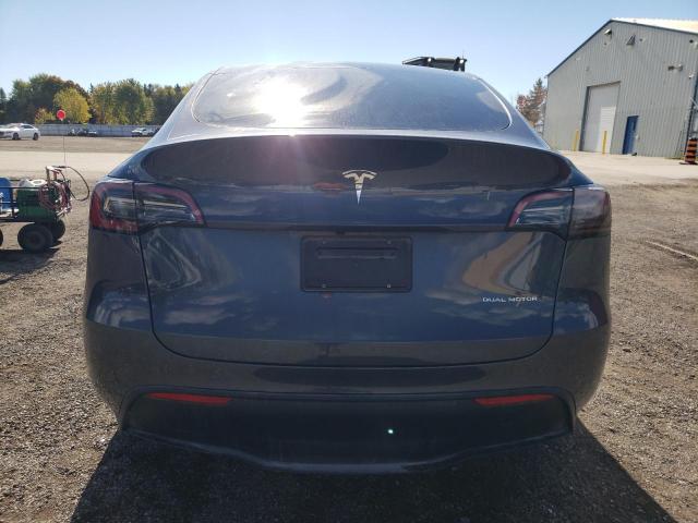 Photo 6 from auction – 2023 TESLA MODEL Y with VIN 7SAYGAEE0PF632830