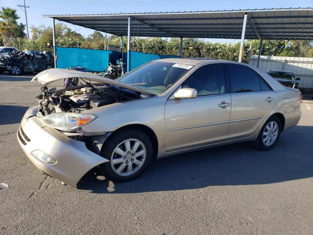 TOYOTA CAMRY LE 2003 with VIN 4T1BF30K33U559643 - Photo from auction