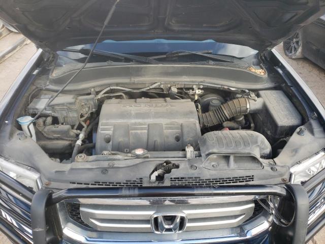 Photo 11 from auction – 2010 HONDA RIDGELINE with VIN 5FPYK1F51AB001321