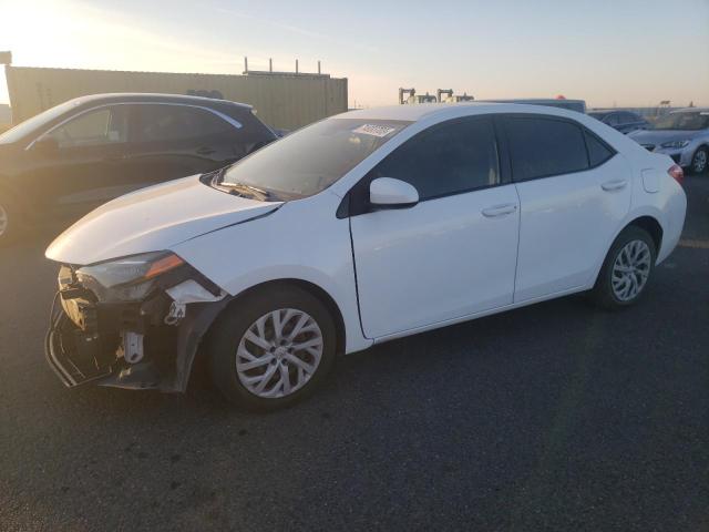 TOYOTA COROLLA L 2019 with VIN 2T1BURHE4KC235267 - Photo from auction