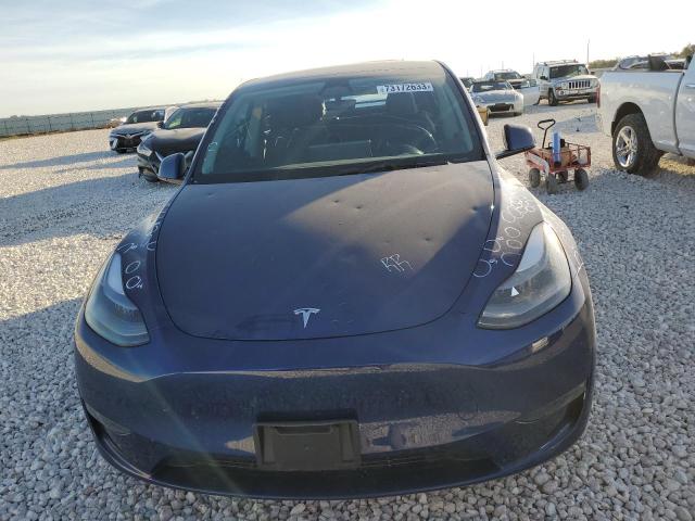 Photo 5 from auction – 2023 TESLA MODEL Y with VIN 7SAYGAEE6PF667730