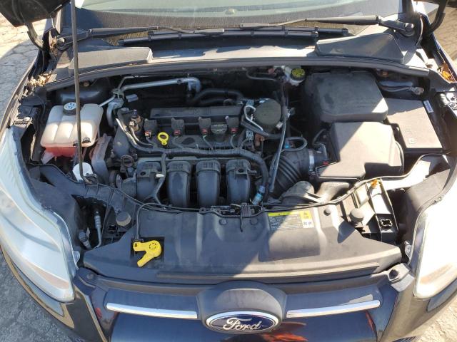 Photo 11 from auction – 2013 FORD FOCUS SE with VIN 1FADP3F21DL111612