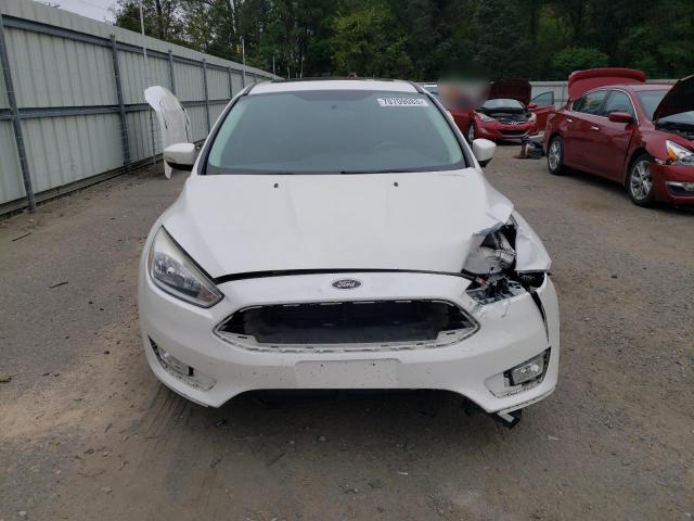 Photo 5 from auction – 2015 FORD FOCUS TITA with VIN 1FADP3N28FL378914