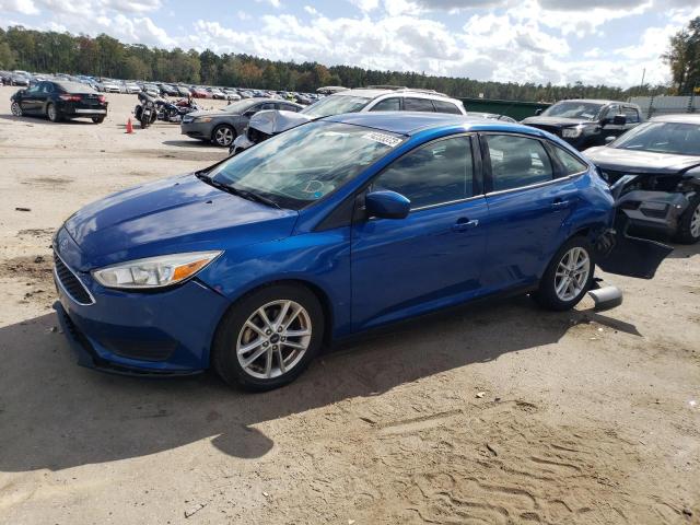 FORD FOCUS SE 2018 with VIN 1FADP3FE2JL201325 - Photo from auction