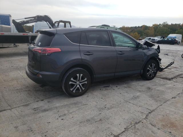 Photo 3 from auction – 2018 TOYOTA RAV4 LE with VIN 2T3ZFREV8JW463404