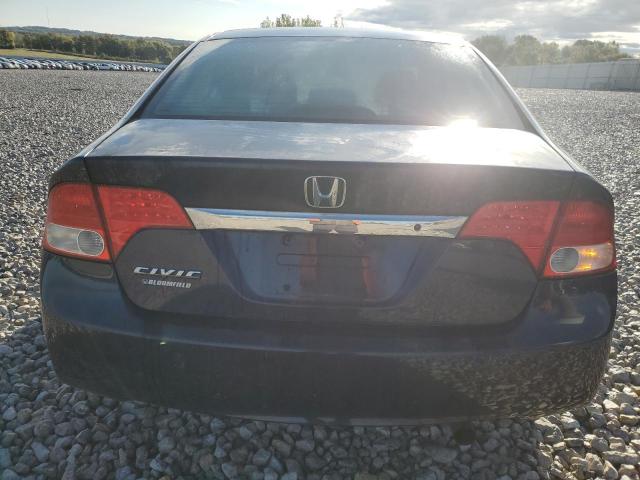 Photo 6 from auction – 2010 HONDA CIVIC LX with VIN 19XFA1F53AE042154