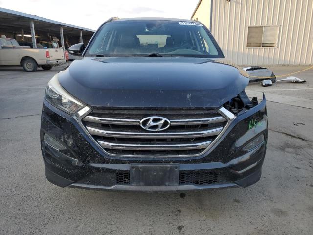 Photo 5 from auction – 2016 HYUNDAI TUCSON LIM with VIN KM8J33A21GU032998