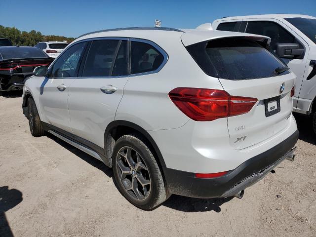 Photo 2 from auction – 2018 BMW X1 XDRIVE2 with VIN WBXHT3C39J3H31386