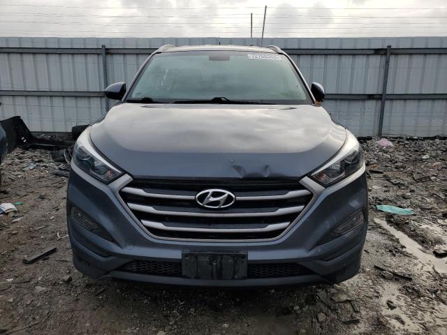 Photo 5 from auction – 2017 HYUNDAI TUCSON LIM with VIN KM8J33A49HU567659