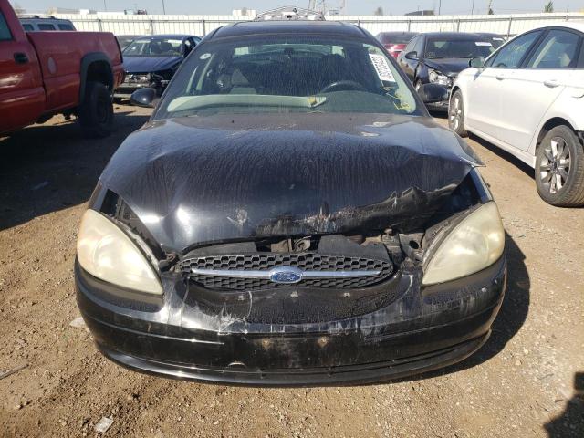 Photo 5 from auction – 2003 FORD TAURUS SE with VIN 1FAFP53U23G211882