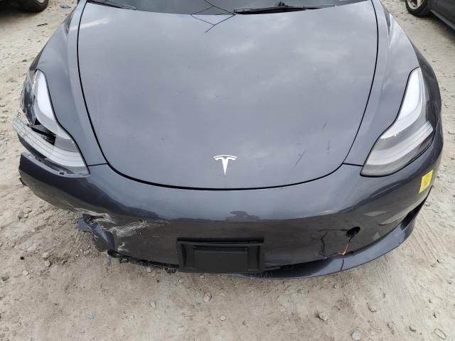 Photo 11 from auction – 2022 TESLA MODEL 3 with VIN 5YJ3E1EBXNF205476