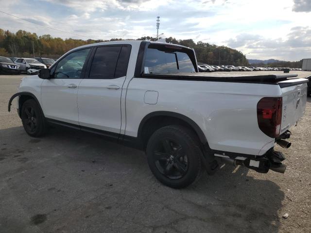 Photo 2 from auction – 2021 HONDA RIDGELINE with VIN 5FPYK3F80MB009758