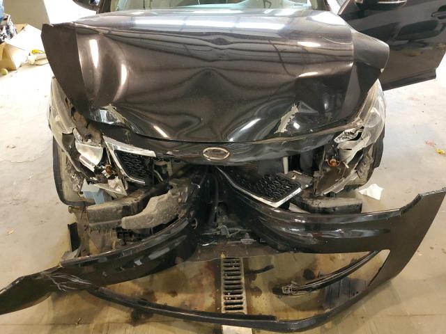 Photo 11 from auction – 2011 KIA OPTIMA LX with VIN KNAGM4A76B5052290