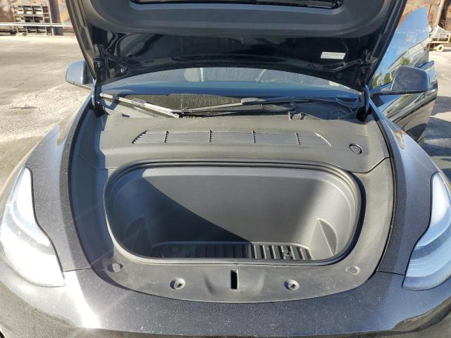 Photo 11 from auction – 2023 TESLA MODEL Y with VIN 7SAYGDEE7PA027444