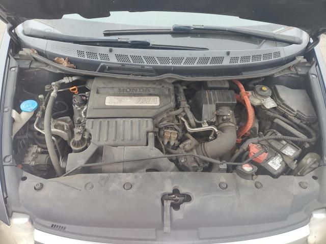 Photo 11 from auction – 2007 HONDA CIVIC HYBR with VIN JHMFA36297S005793
