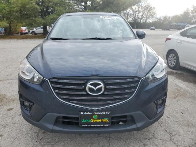 Photo 5 from auction – 2016 MAZDA CX-5 GT with VIN JM3KE2DY7G0659037