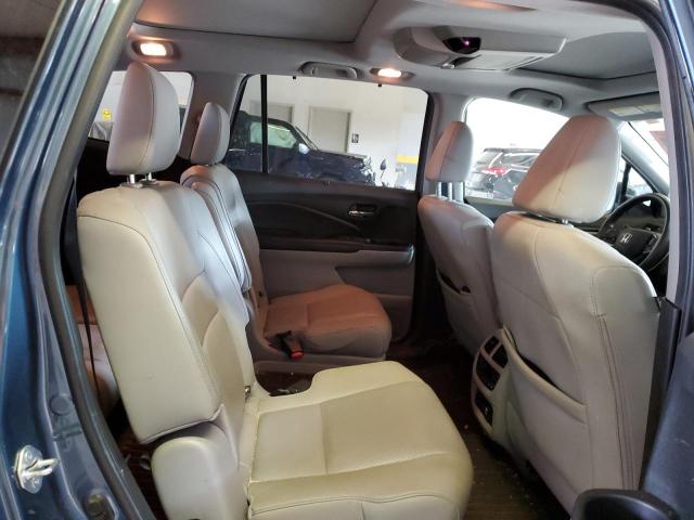 Photo 11 from auction – 2021 HONDA PILOT ELIT with VIN 5FNYF6H00MB083204