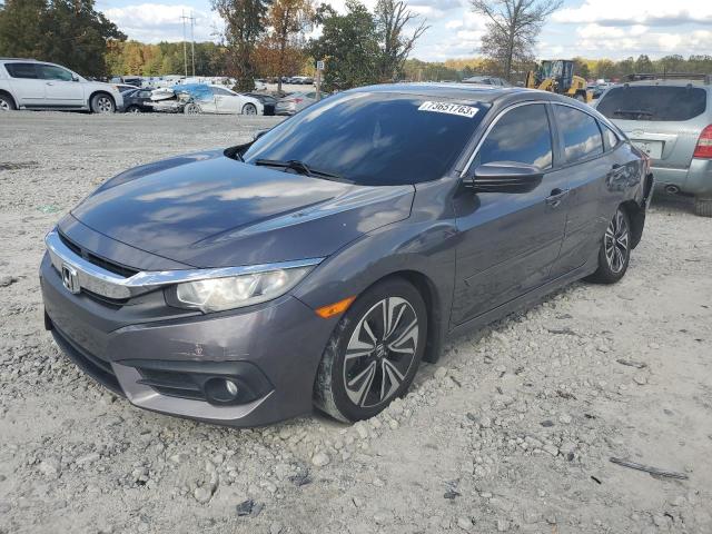 HONDA CIVIC EX 2016 with VIN 19XFC1F3XGE000338 - Photo from auction