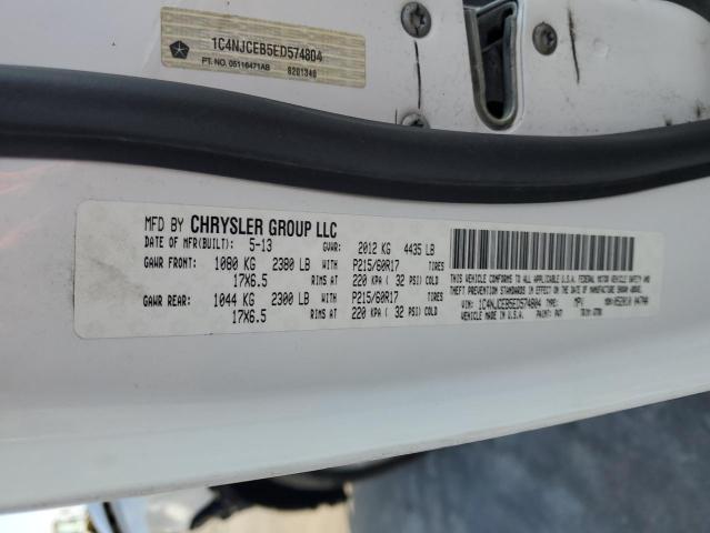 Photo 14 from auction – 2014 JEEP COMPASS LA with VIN 1C4NJCEB5ED574804