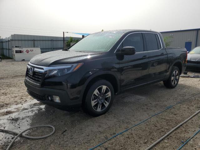 HONDA RIDGELINE 2017 with VIN 5FPYK3F5XHB030497 - Photo from auction