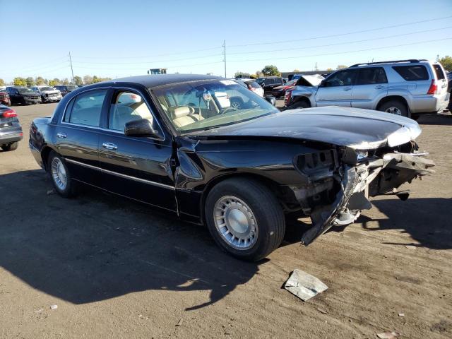 Photo 4 from auction – 2000 LINCOLN TOWN CAR E with VIN 1LNHM81W3YY828738
