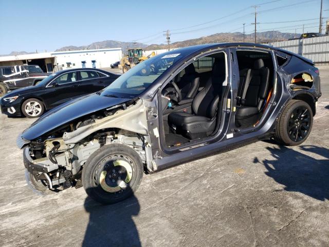 TESLA MODEL Y 2023 with VIN 7SAYGDEE1PF843598 - Photo from auction