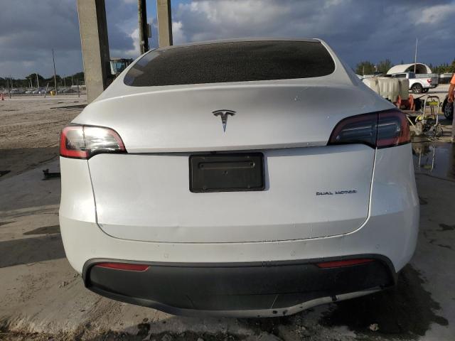 Photo 6 from auction – 2021 TESLA MODEL Y with VIN 5YJYGDEE5MF078677