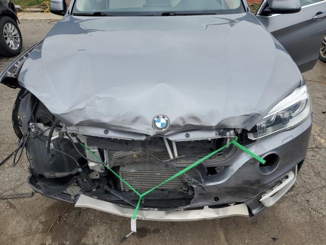 Photo 11 from auction – 2014 BMW X5 XDRIVE3 with VIN 5UXKR0C51E0K45112