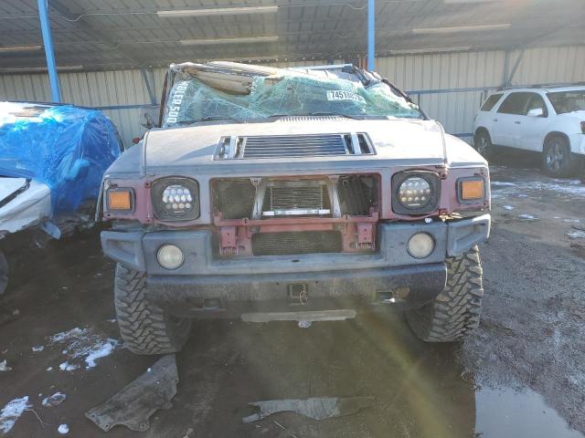 Фото 5 с аукциона – 2003 HUMMER H2 с VIN 5GRGN23U83H142434