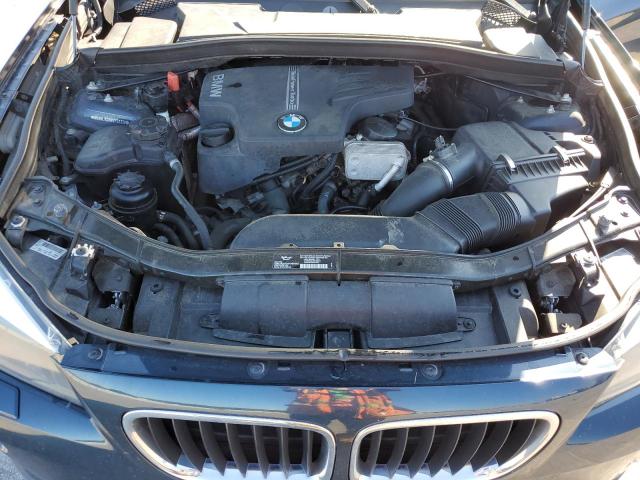 Photo 11 from auction – 2014 BMW X1 XDRIVE2 with VIN WBAVL1C58EVY23339