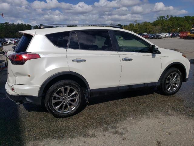 Photo 3 from auction – 2018 TOYOTA RAV4 LIMIT with VIN JTMYFREV4JJ205309