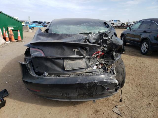 Photo 6 from auction – 2021 TESLA MODEL 3 with VIN 5YJ3E1EC4MF095998