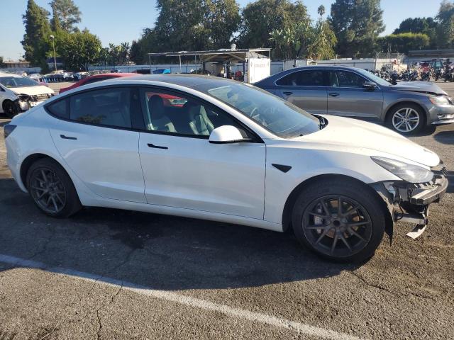 Photo 4 from auction – 2021 TESLA MODEL 3 with VIN 5YJ3E1EA9MF068228